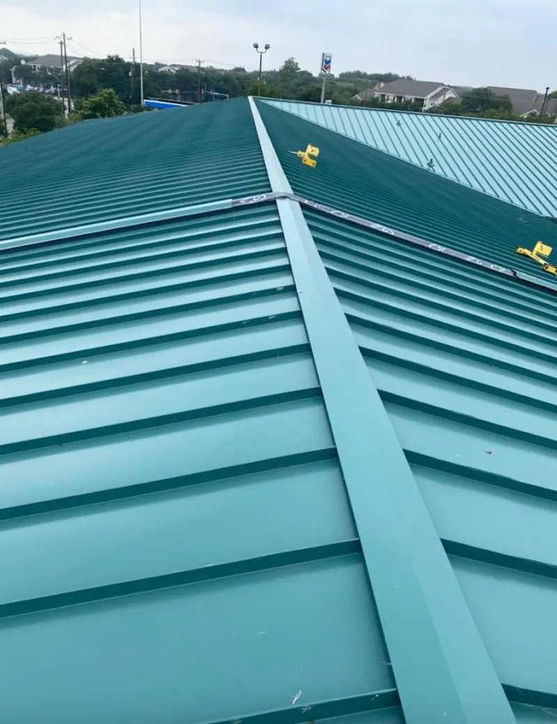 Green commercial metal roof ridge and valley for Metal Roof Repair in Desert Palms